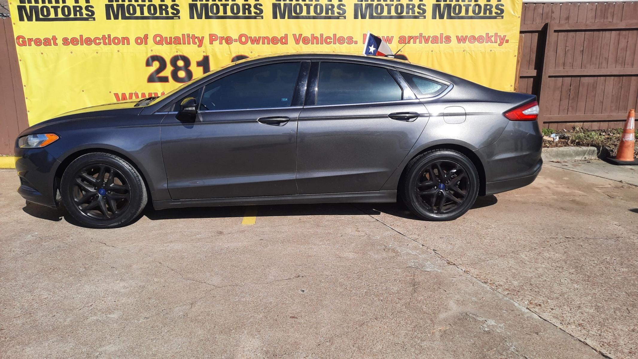 2016 Ford Fusion (3FA6P0H71GR) , located at 16710 Clay Rd., Houston, TX, 77084, (281) 859-7900, 29.834864, -95.656166 - Photo #1